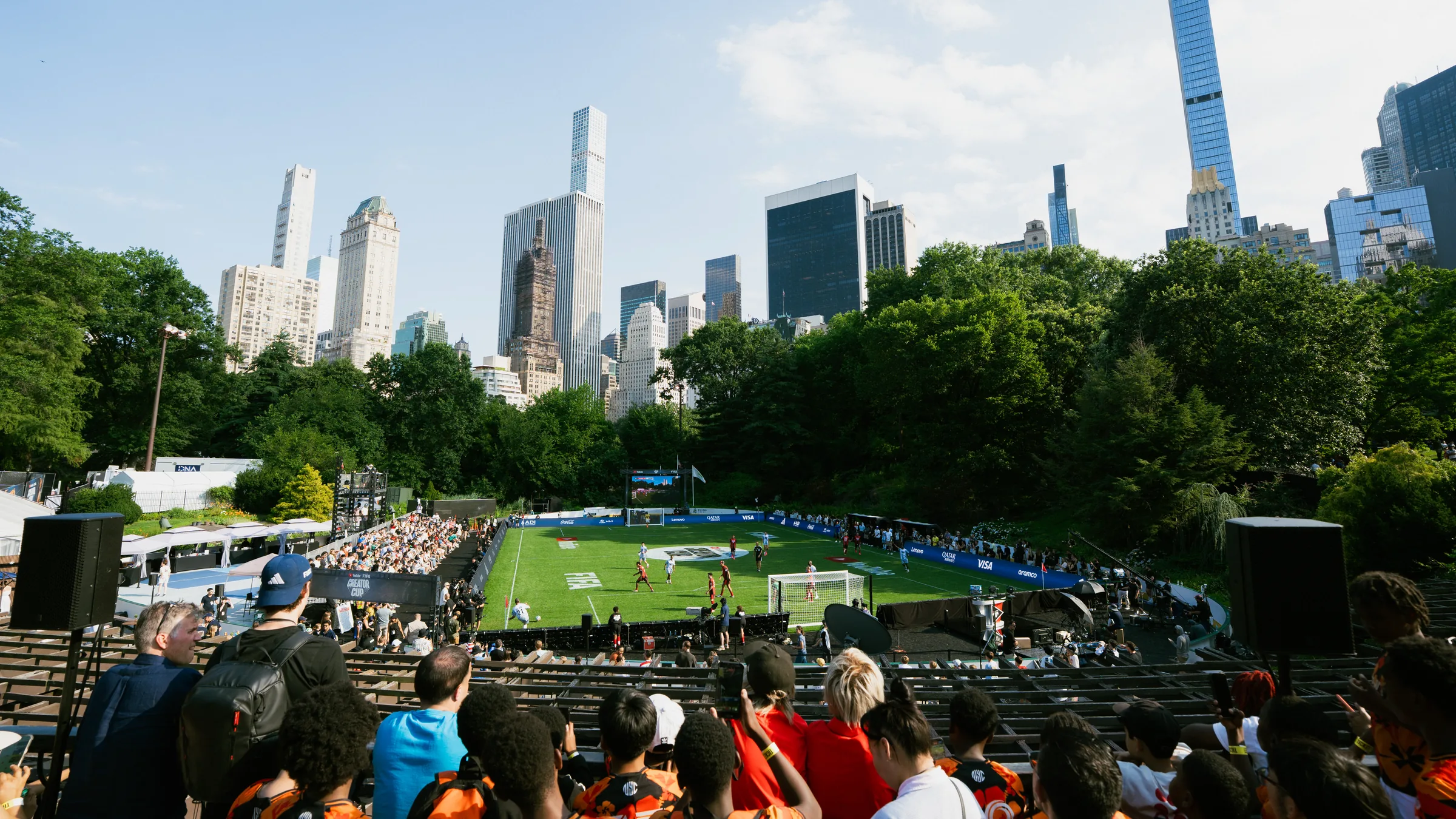 The Creator Cup pitch in Central Park, the Manhattan skyline behind a packed stand